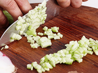 Image of person dicing onions